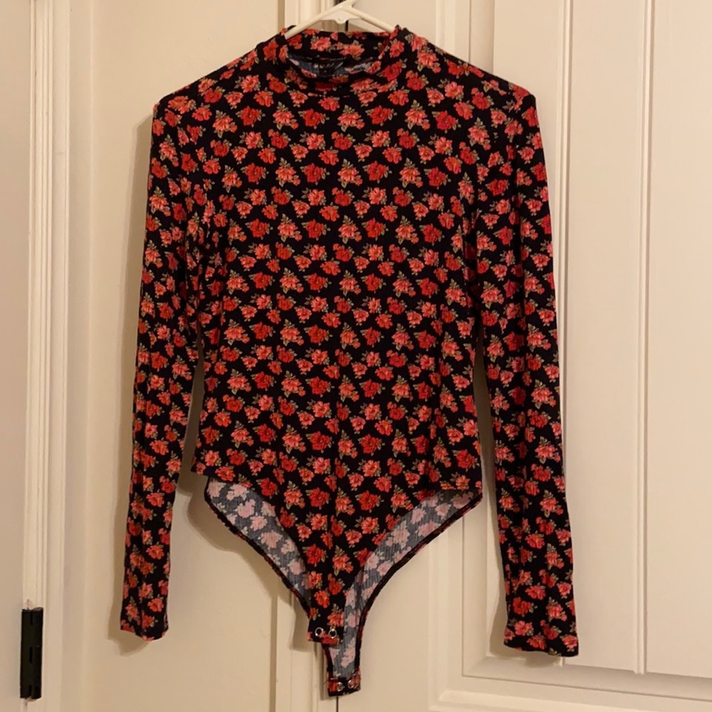 From Forever 21. Medium size, floral bodysuits.